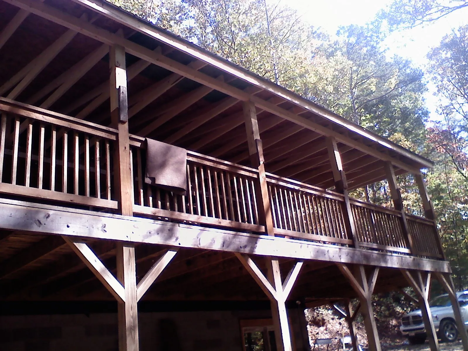 Timber framing under a new elevated porch and deck — Roof Leak Repair in Eagle Bay by Roofing Brothers